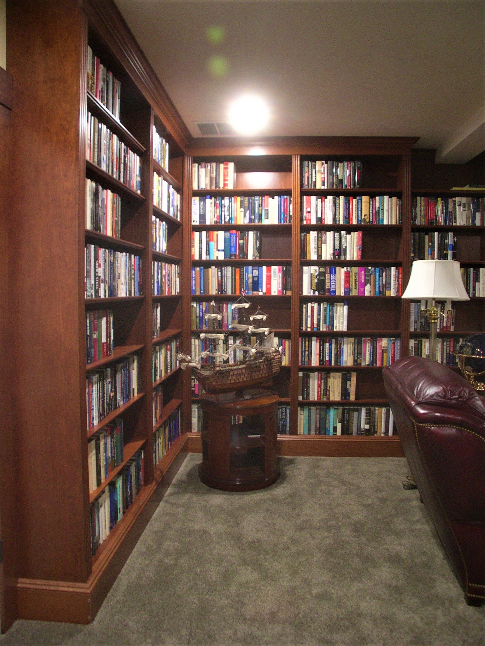   Downstairs library bookcases, stained cherry with clear lacquer finish - corner  