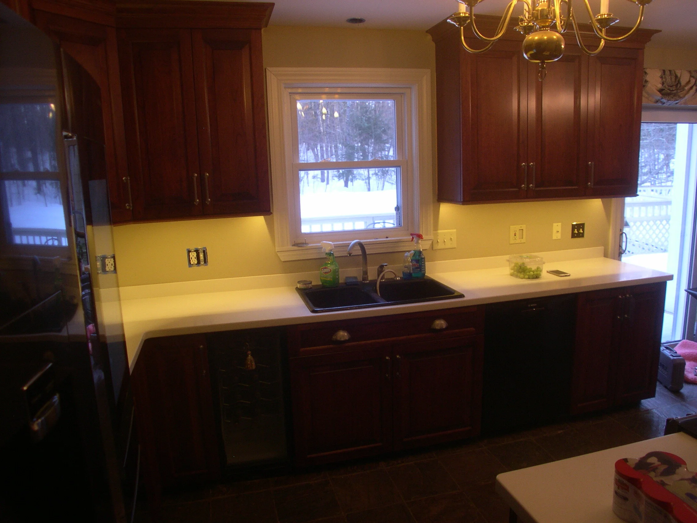   Cherry stained kitchen with raised panels, sprayed with clear lacquer - outer wall  