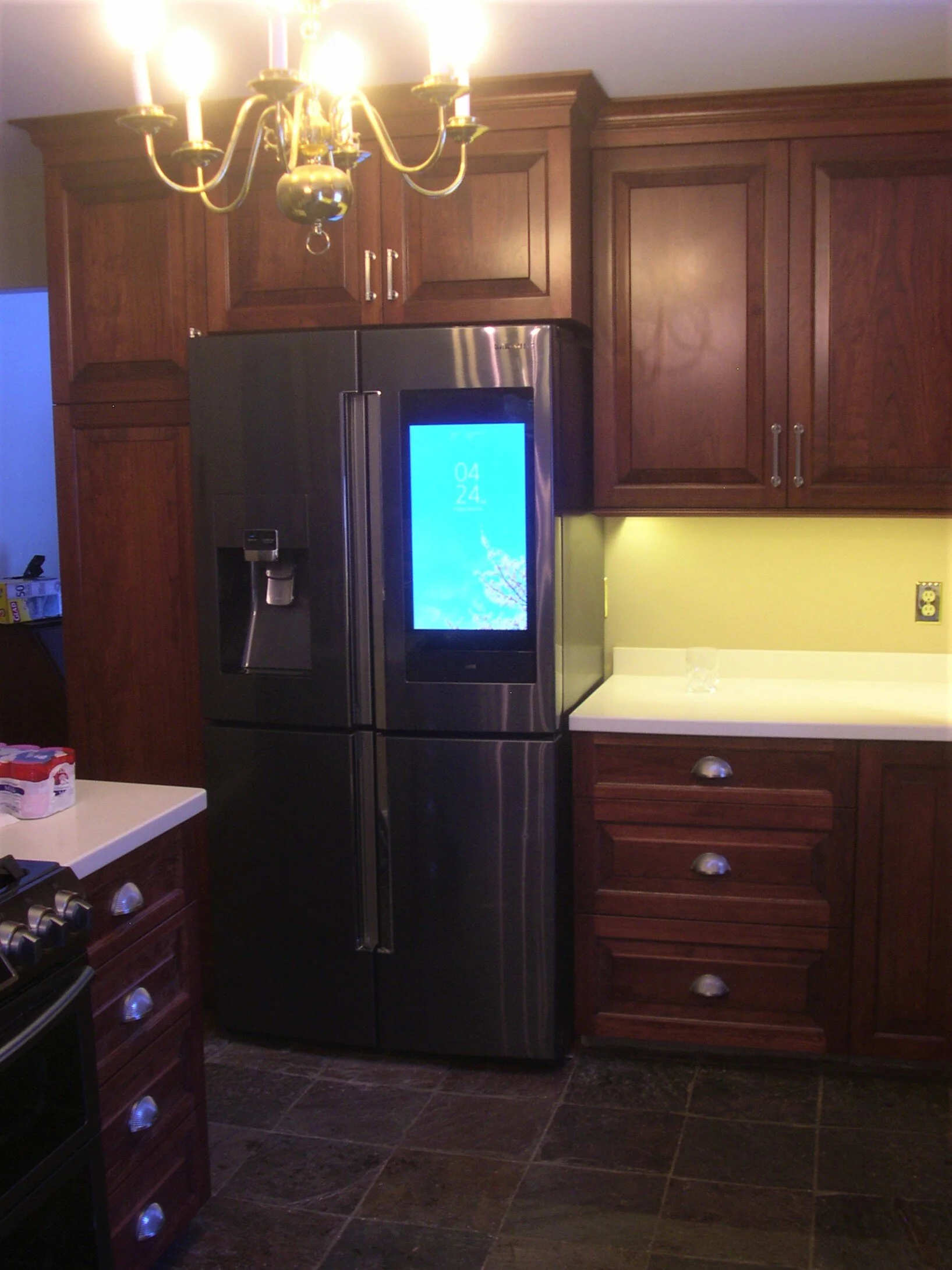   Cherry stained kitchen with raised panels, sprayed with clear lacquer  