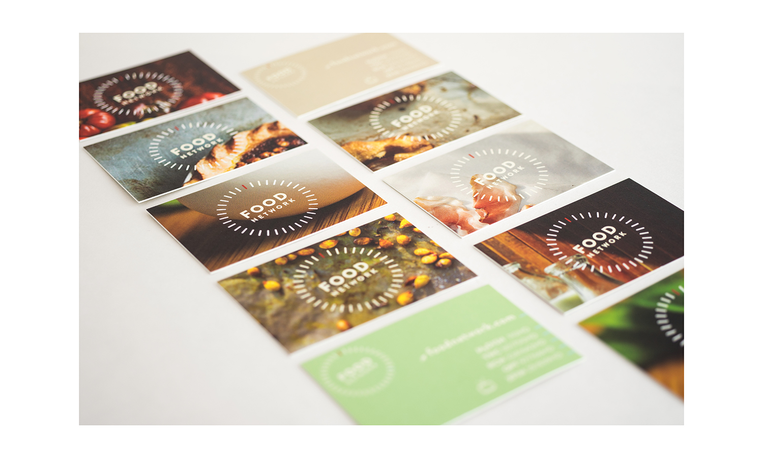 Variety of card designs; chosen to conceptually echo the variety of chefs, food methods, multi-media platforms and shows that the Food Network has. Each back has two designs w/ contact info (see top right brown card, and bottom left green card). Photographer credit: Scott-Tsai.com