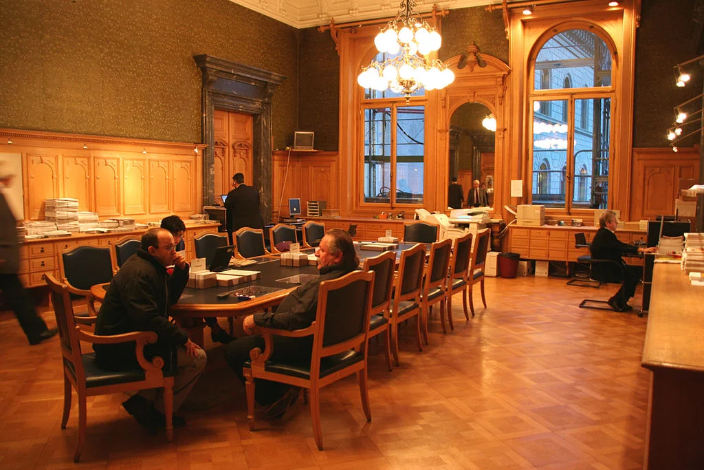 Bild: Vorzimmer Nationalrat Wintersession 2006 , Autor unbekannt, via Wikimedia Commons