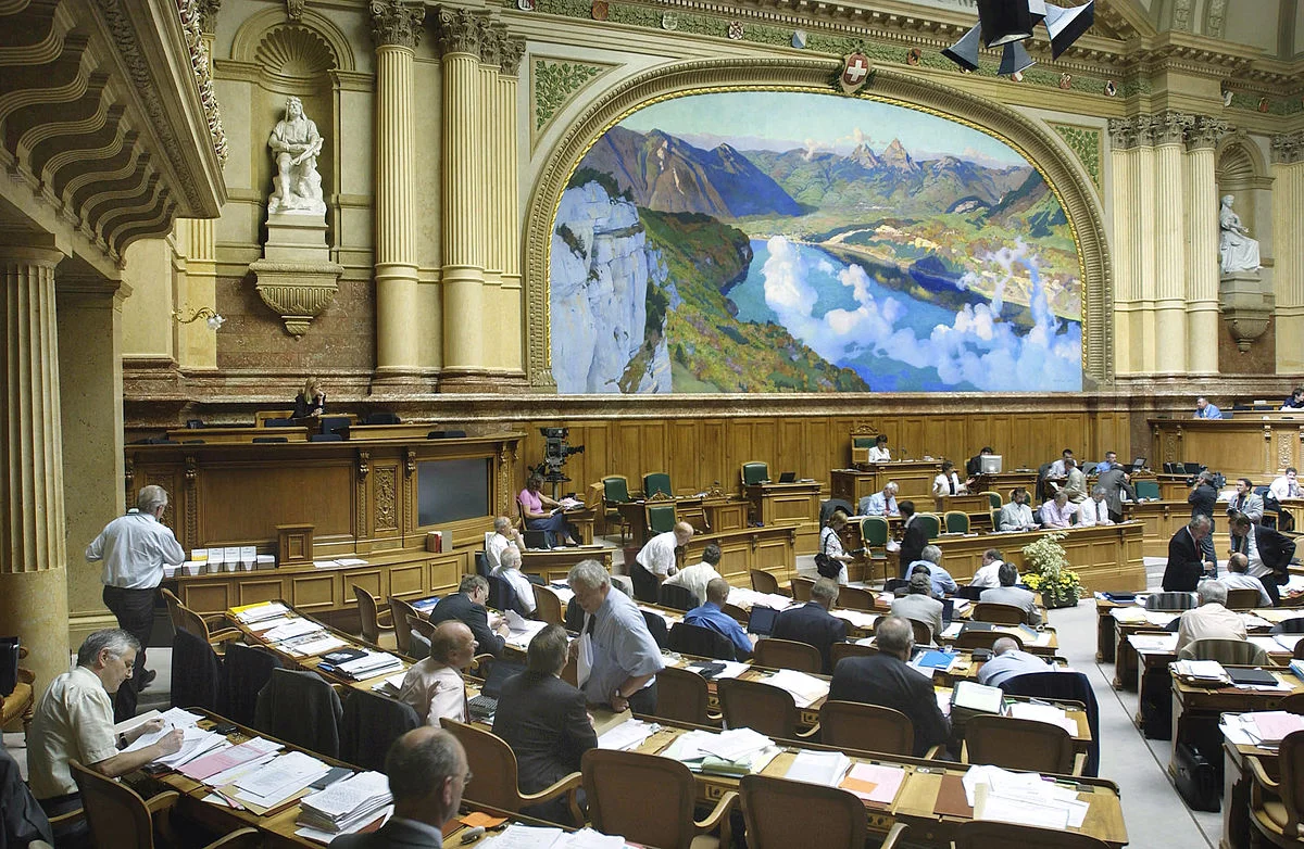 "Swiss National Council Session" by Peter Mosimann - Swiss Parliament web site. Licensed under Copyrighted free use via Wikimedia Commons