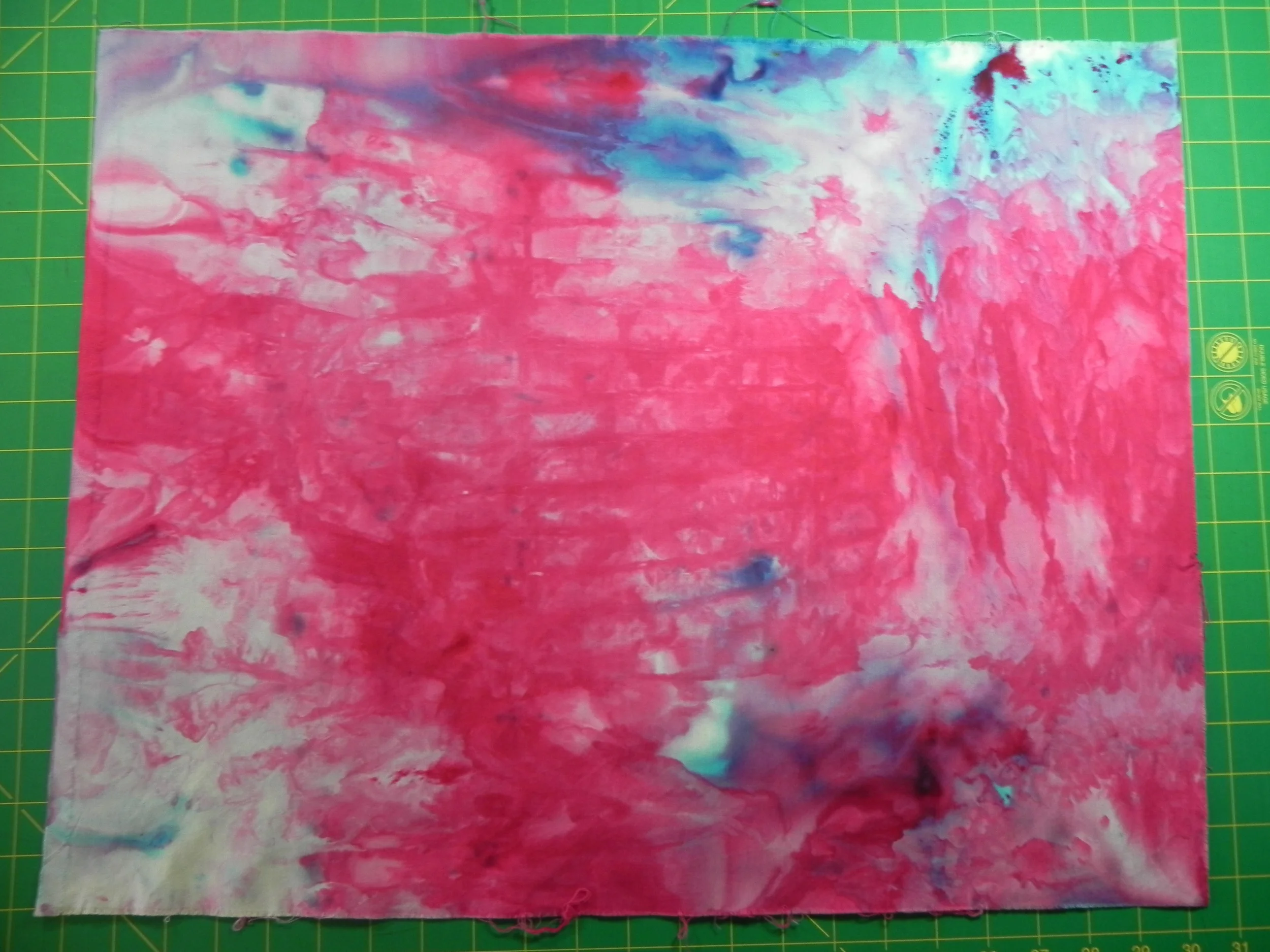 Fabric scrunched on top of tray--note imprint of wire rack in colors. Great texture!
