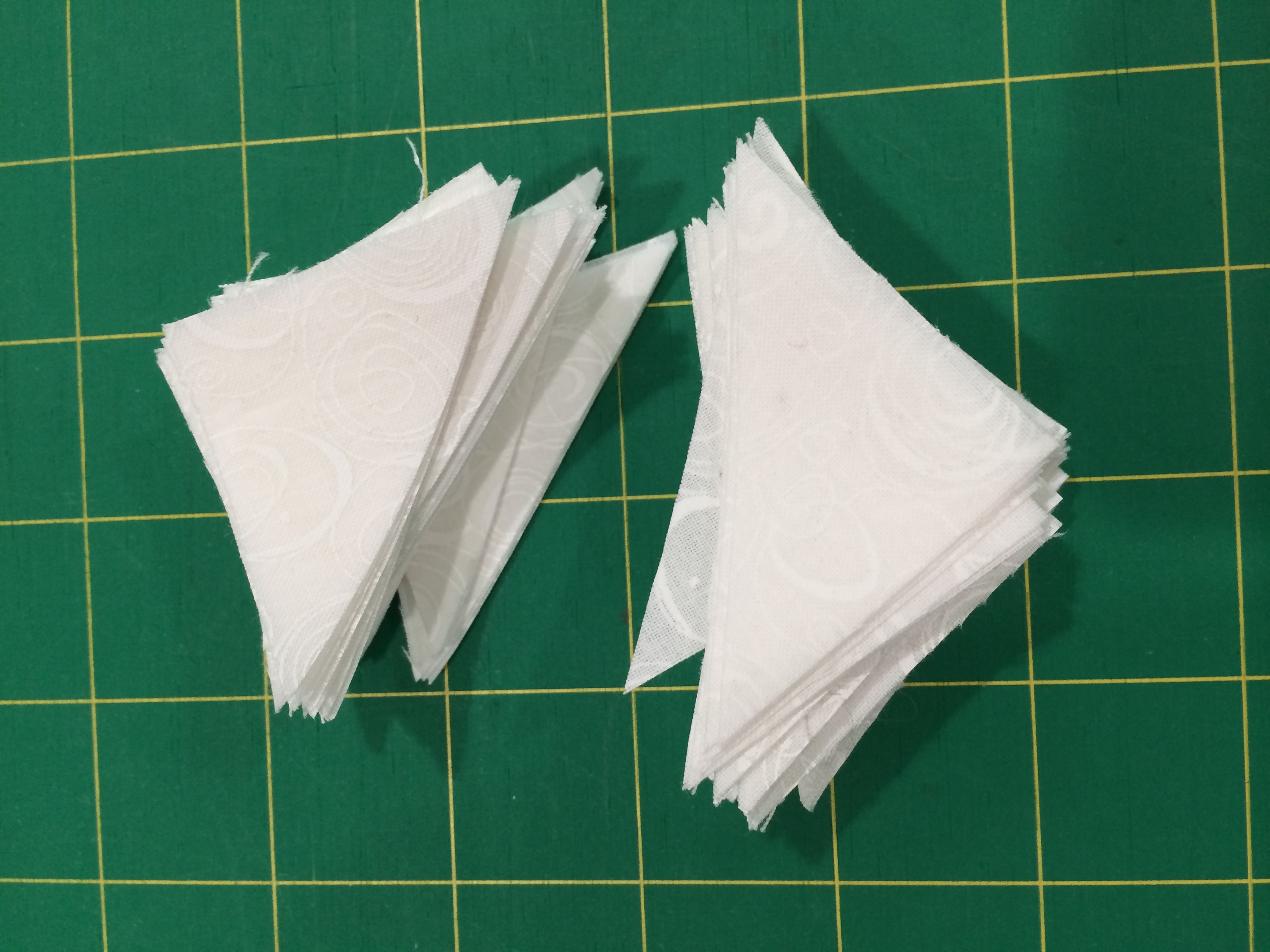 I 'm a huge fan of a nice, crisp, white background on a scrap quilt. My white background is scrappy, but all the same white.