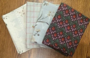 Maybe this set of soft, mostly taupe-y, somewhat William Morris-y, fat quarters will come home to live with you!