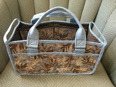 Caddy back (not to be confused with "Caddyshack")--the back panel has three pockets on it, whereas the front panel has two.