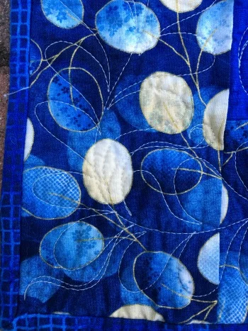 Border quilting detail. Plus, I am so pleased with that border fabric--it was the perfect find!
