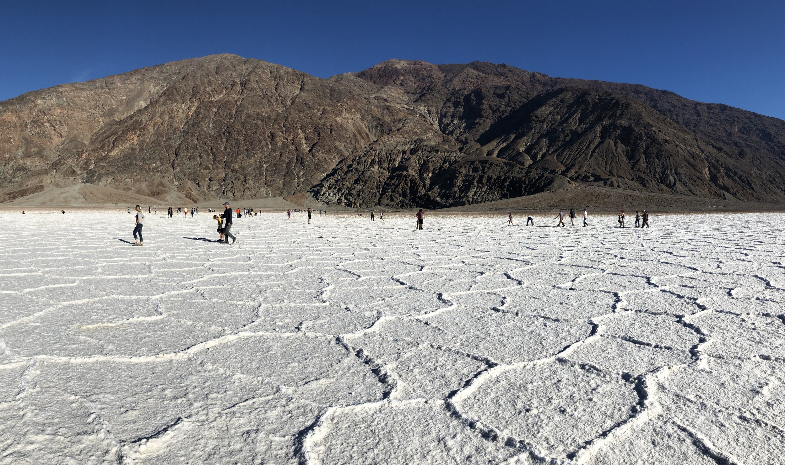 All visitors should walk at Badwater Basin, 282 feet below sea level, site of the hottest recorded temperature in North America.  (Don’t walk there in summer!)