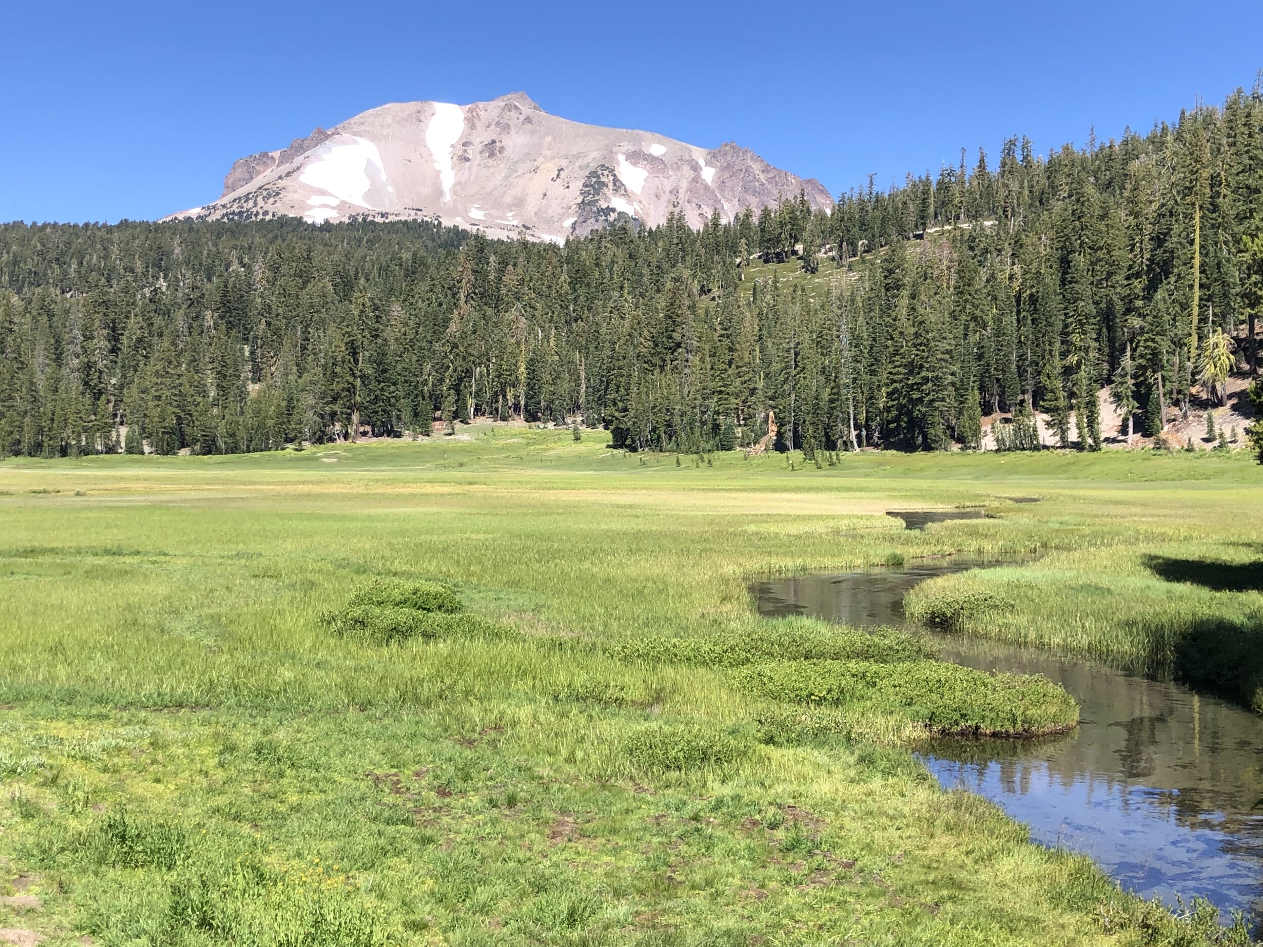 Though Lassen Peak appears to be sleeping peacefully, it’s still an active volcano, as the park’s boiling mud pots, fumaroles, and hot springs clearly illustrate.