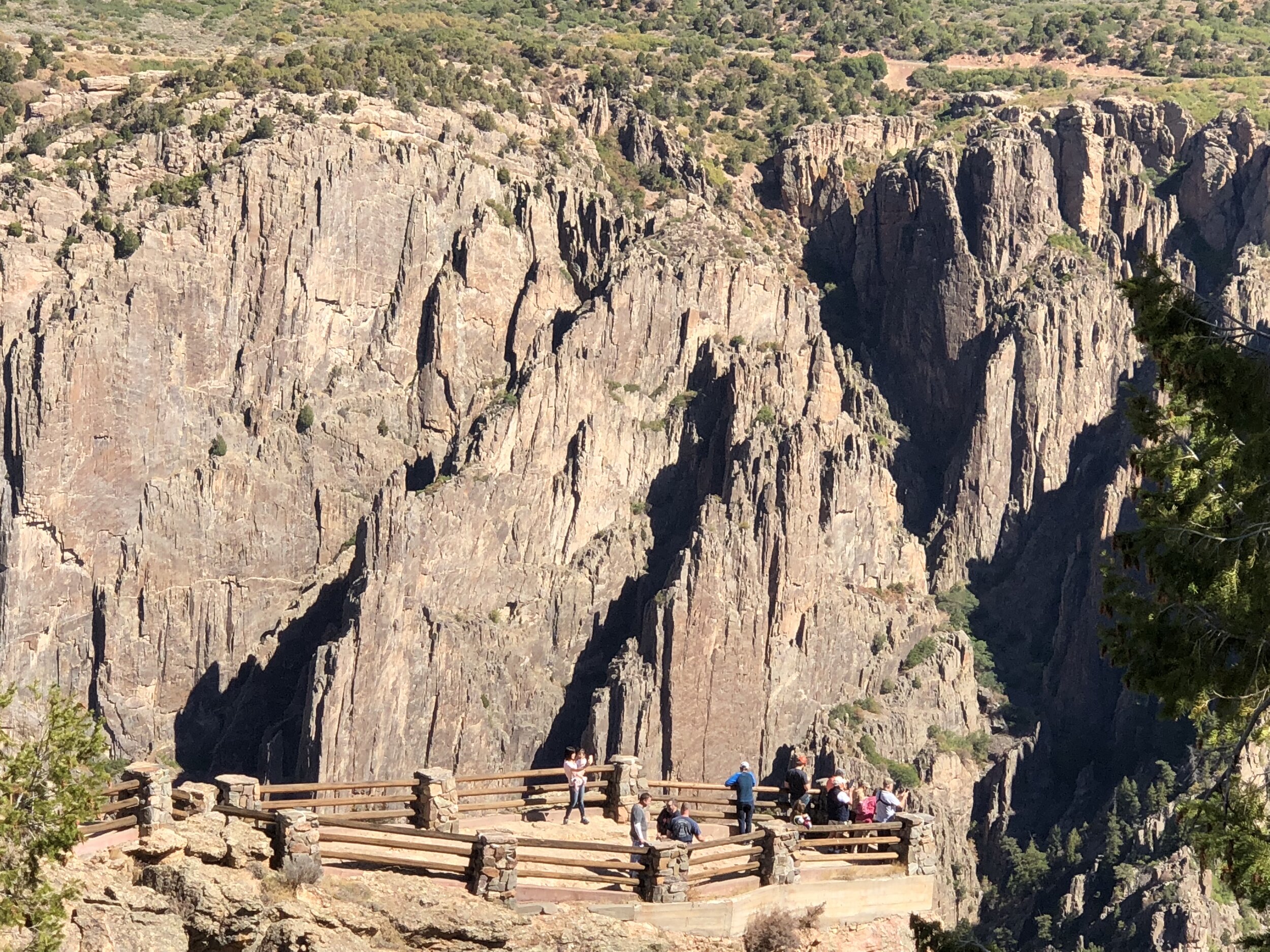 Visitors peer into the depths of the Black Canyon of the Gunnison.