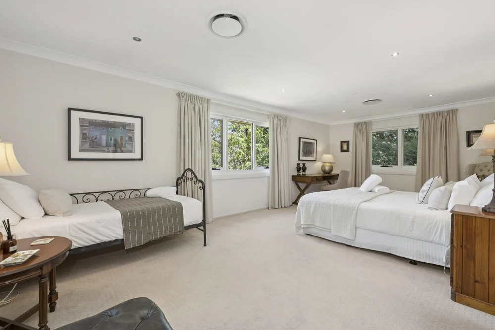 Bedroom 1 with a king bed and a single day bed