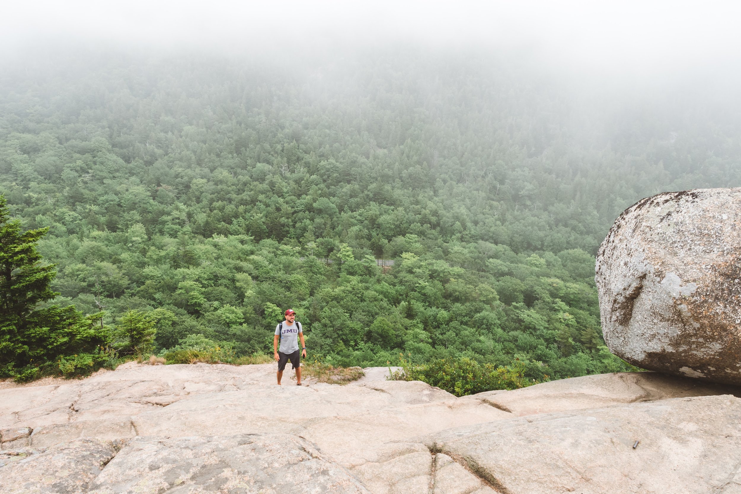 Luis stands near Bubble Rock.