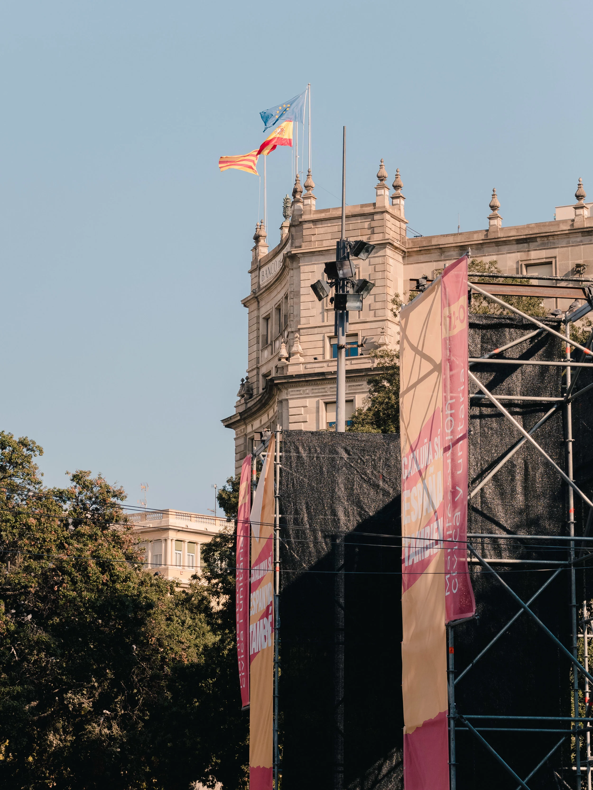 The leftover stage from a morning political demonstration on Catalunya Square.