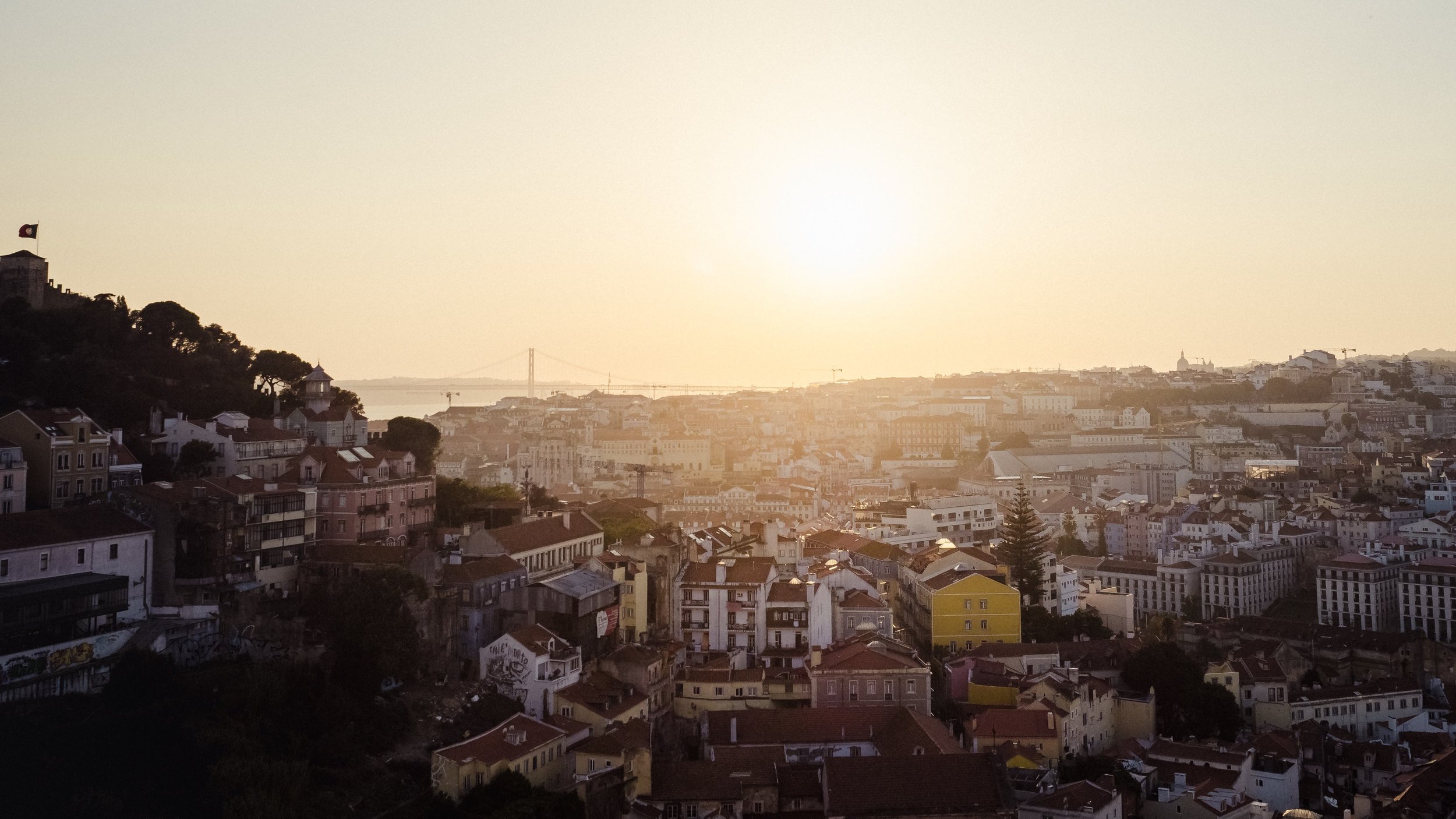A Lisbon sunset, as seen from Miradoura da Graça.