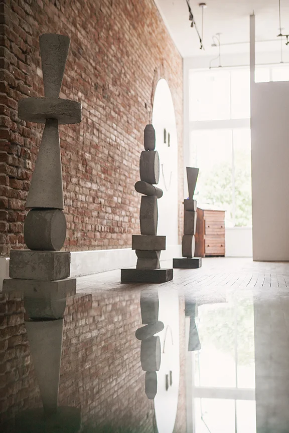 The Rigden Kings (Installation view) Tejasvin (Bearer of the Dharma Wheel) (foreground) 15" x 15" x 50" Concrete Available Sureshana (Uprooter of Karma) (middleground) 24" x 15" x 52" Concrete SOLD Vishvamurti (Conqueror of False Leaders) (background) 13" x 13" x 49" Concrete Available
