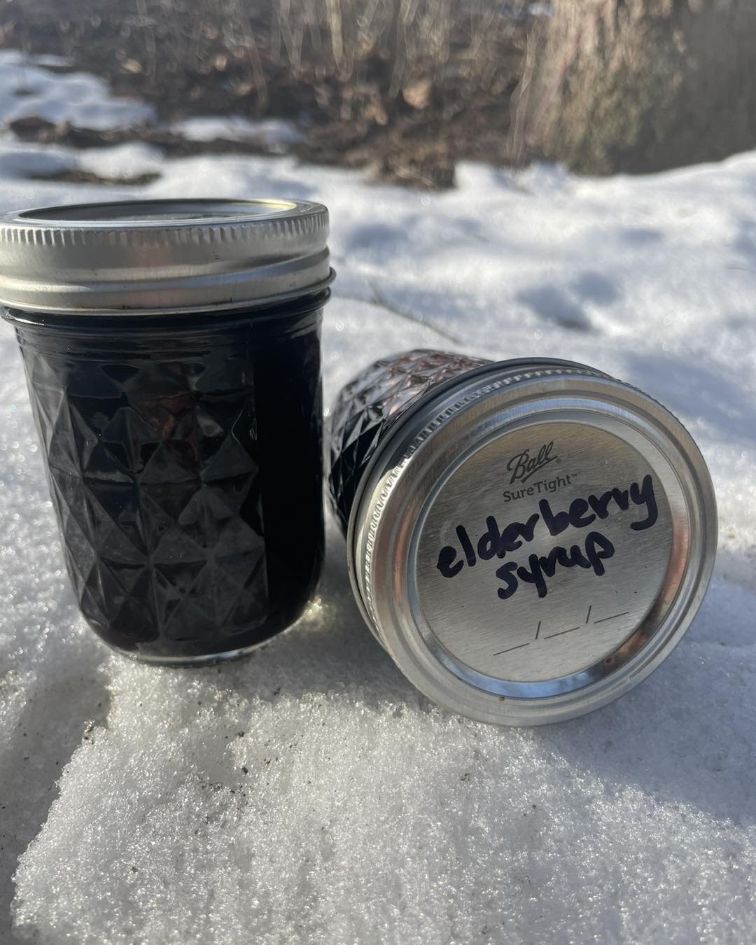 elderberry syrup in snow.jpg