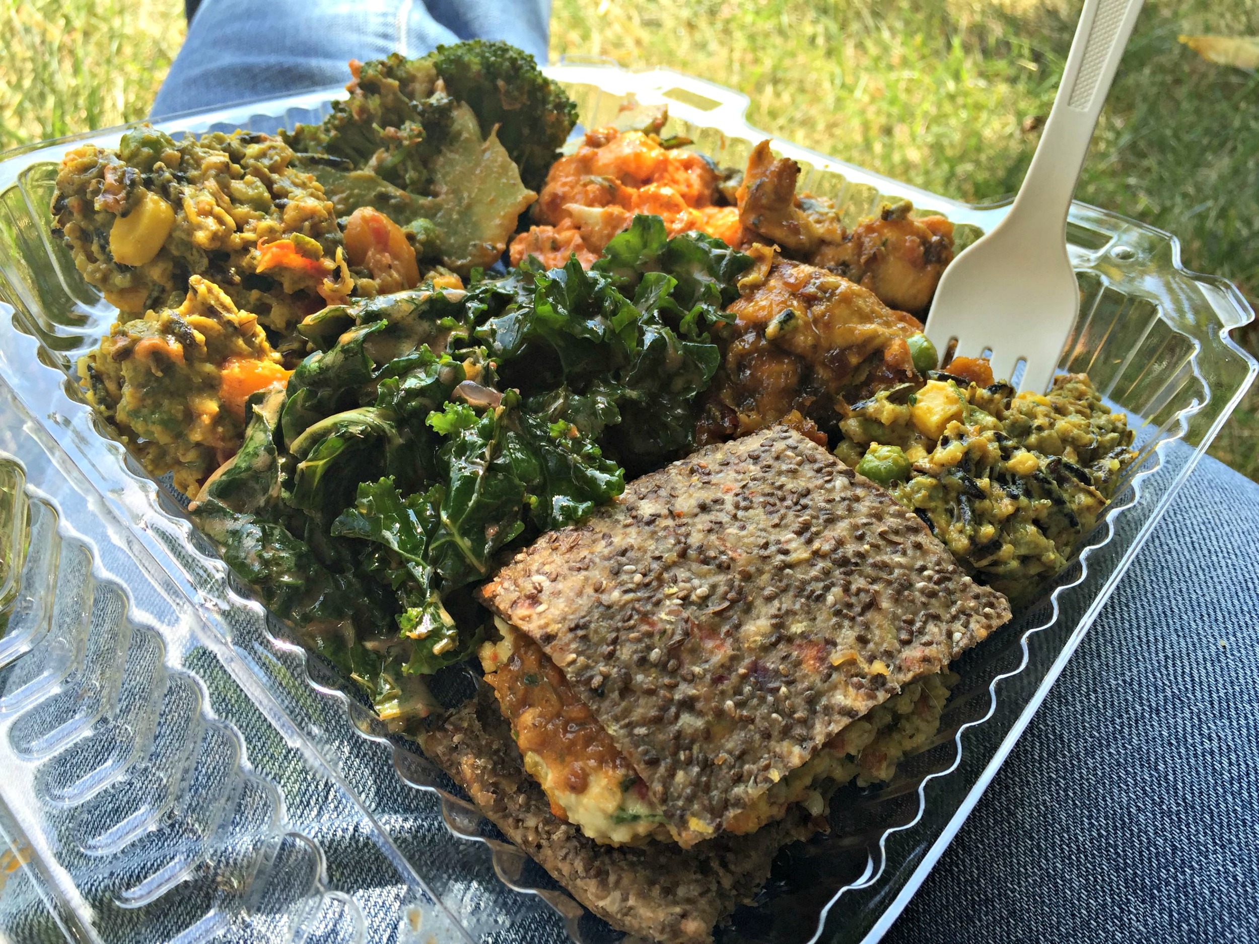 Raw vegan goodness from Khepra's - almond hemp burger, cauliflower bites, curried wild "rice", broccoli and "fried" plantains