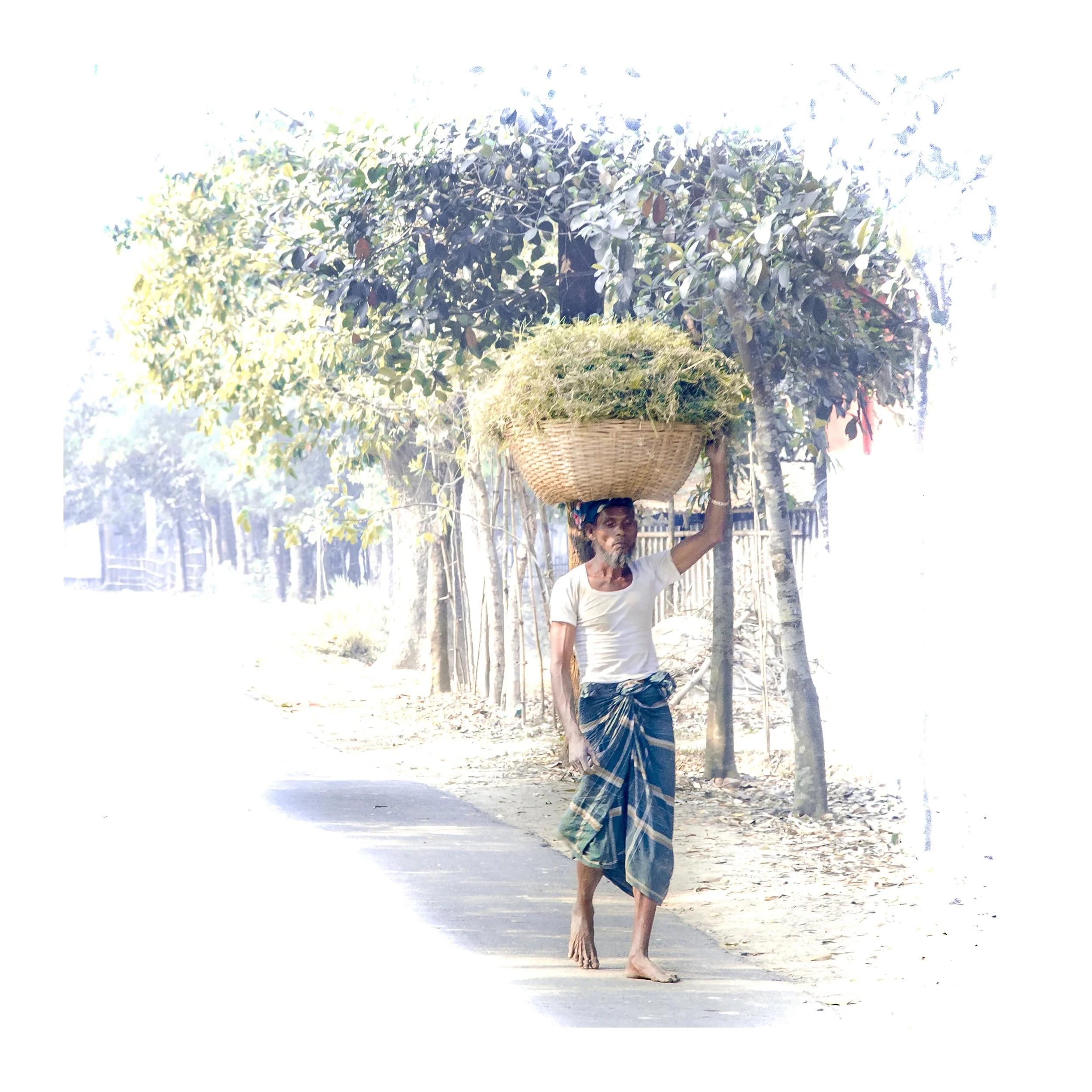 J Bawtree 5 - Man with Basket on Head.jpg