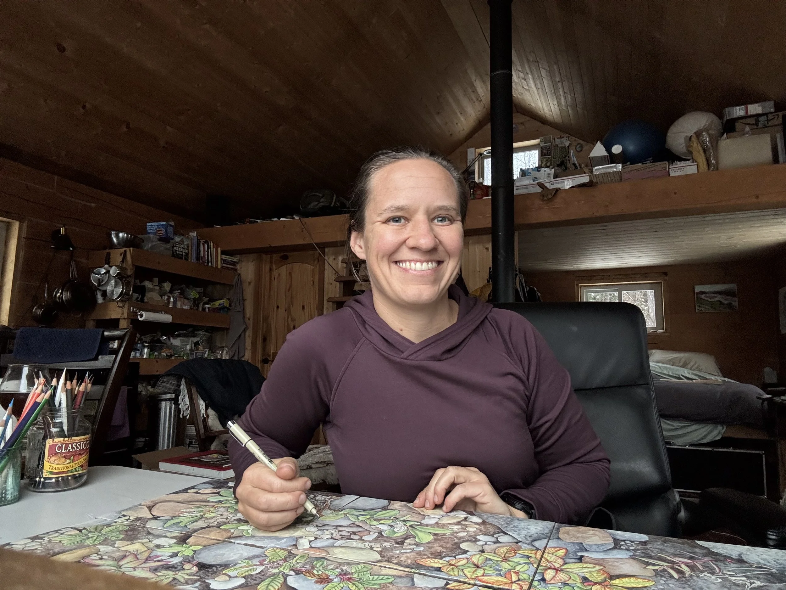  Working on artwork about glacier succession in our cabin 