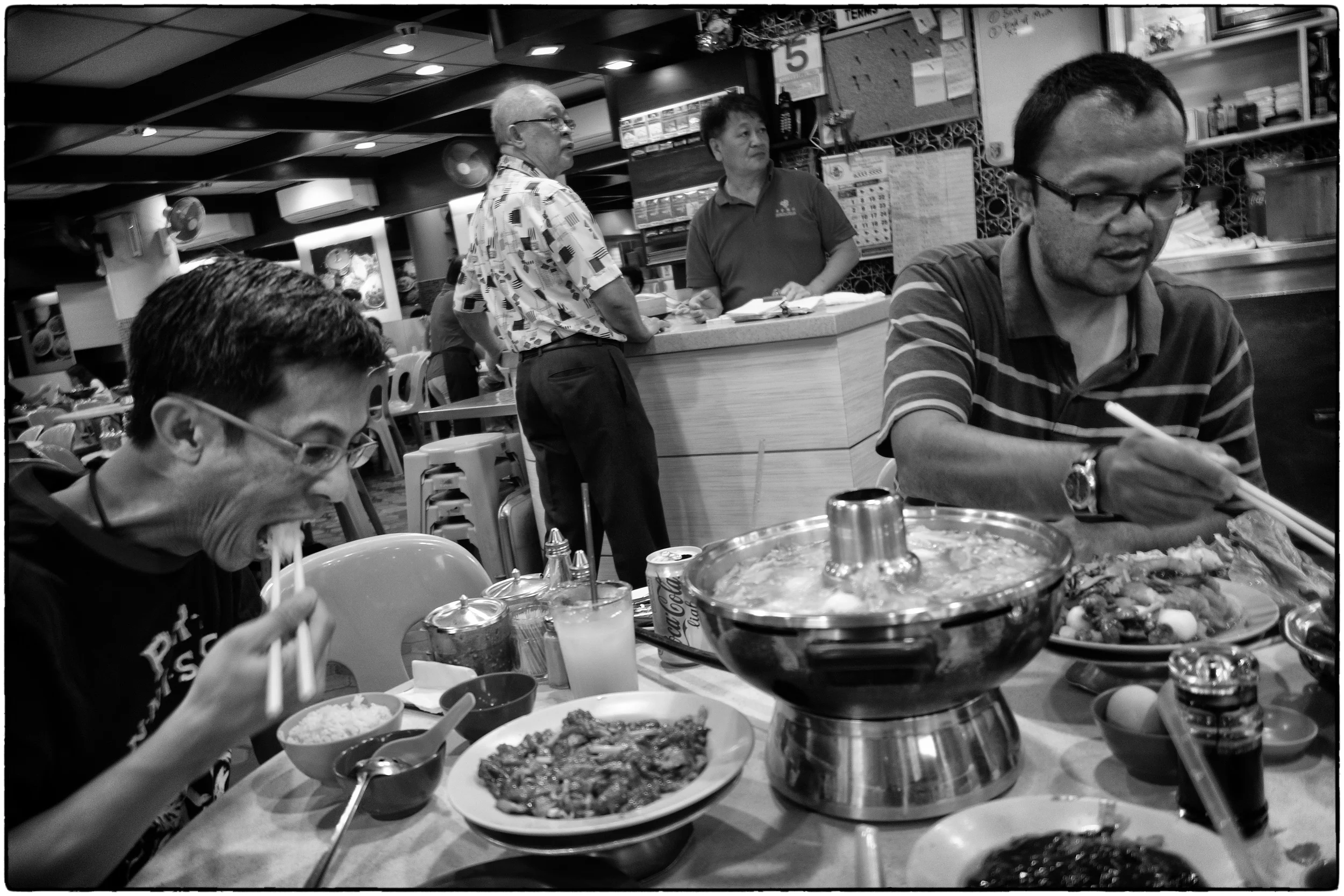 Faculty members Chee Yong and Dita, refueling at dinner, getting ready for a long night of critiquing. 