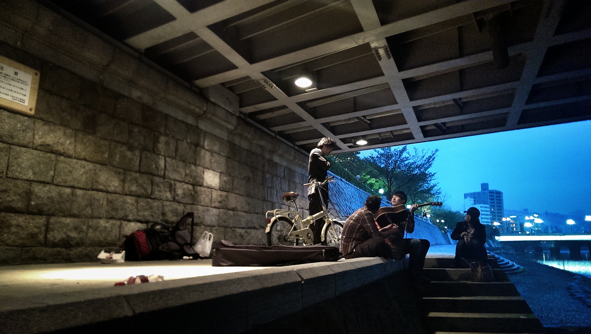 Making music under a bridge at the Hiroshima Peace Memorial Park.