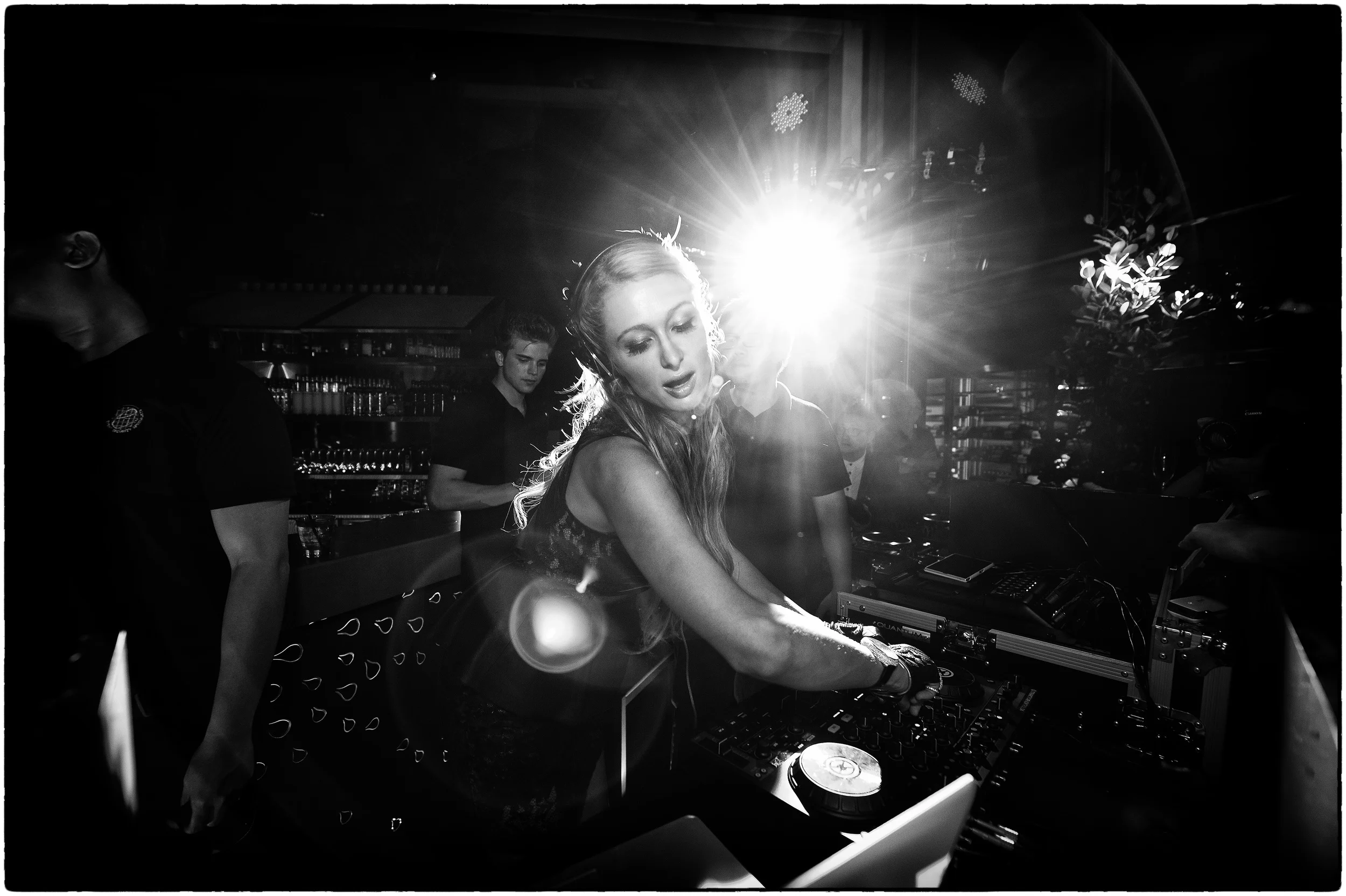 Paris Hilton spinning at ME@OUE af a Singapore GP after-party.