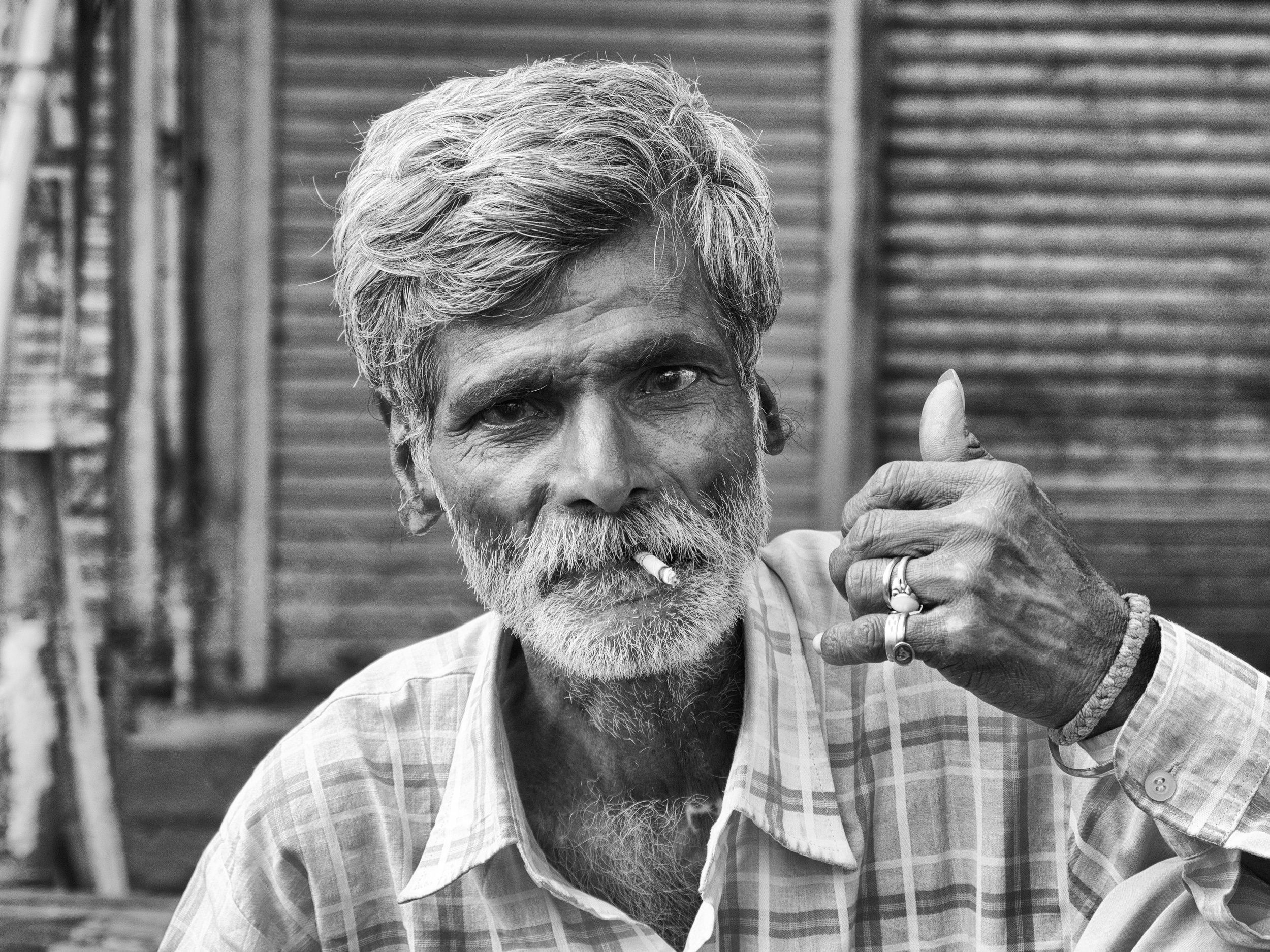 Man with Cigarette at Spice Market in Black and White - Old Delhi, India - Copyright 2016 Ralph Velasco.jpg