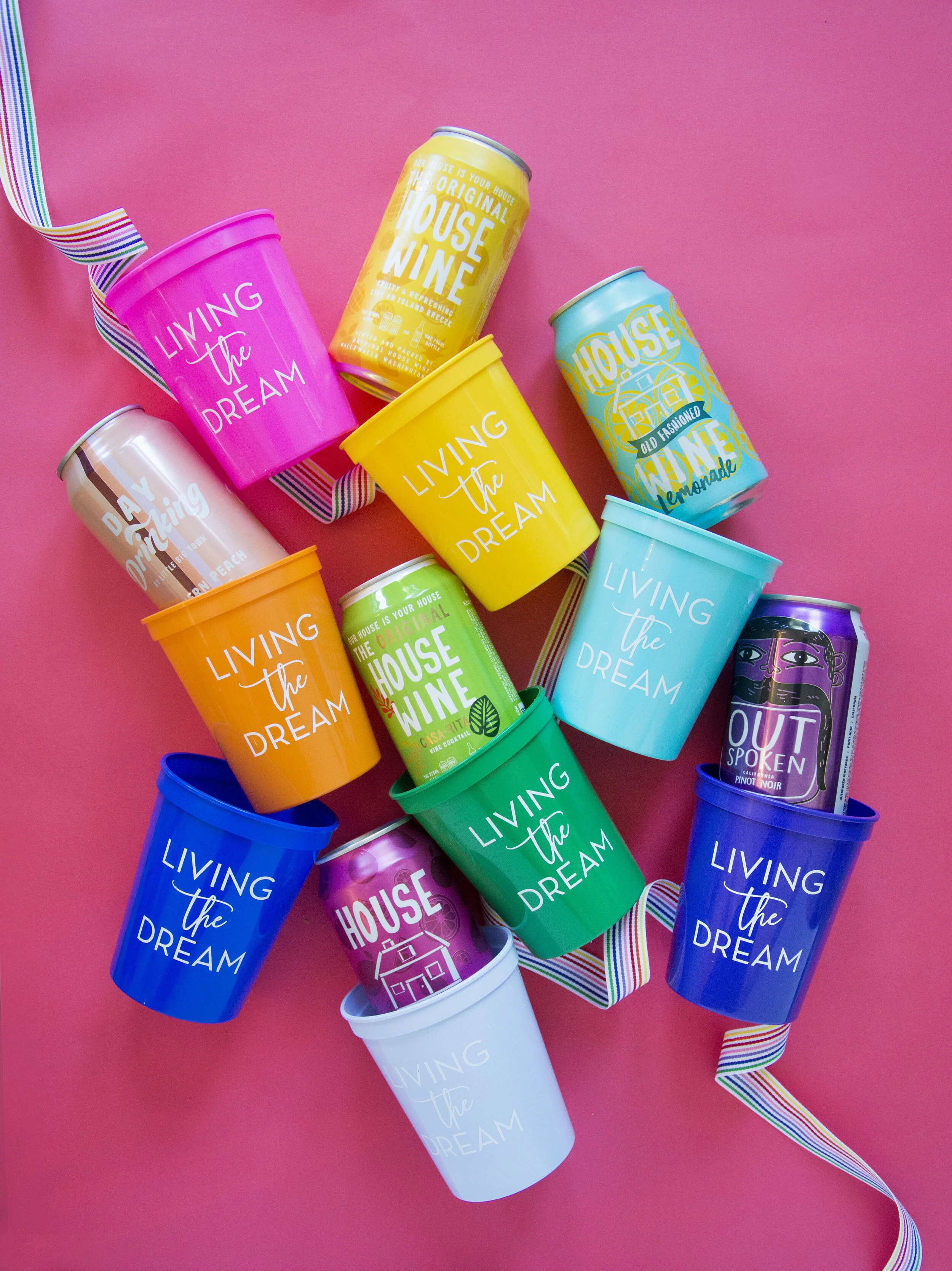 CPC_RainbowDream_Assorted_Stylized_WineCans_PinkBackground_HautePapier.JPG