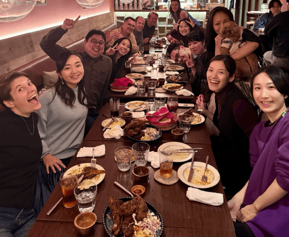 Pirates of Tokyo Bay cast eating dinner together after their monthly improv show in Ebisu Tokyo