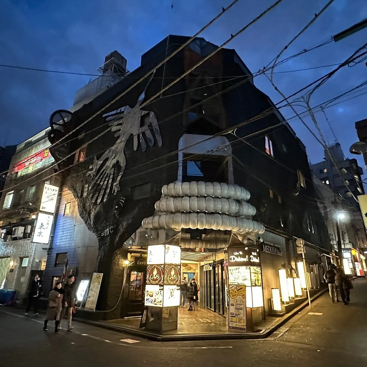 Ebisu neighborhood at night with the What the Dickens! comedy venue where Pirates of Tokyo Bay perform monthly