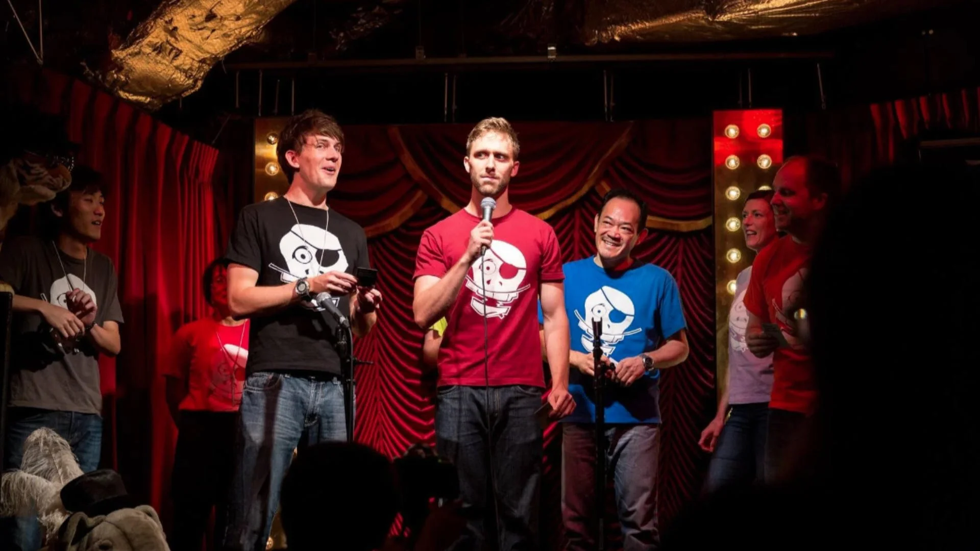 Performers switching between English and Japanese during an improv scene at Pirates of Tokyo Bay in Ebisu