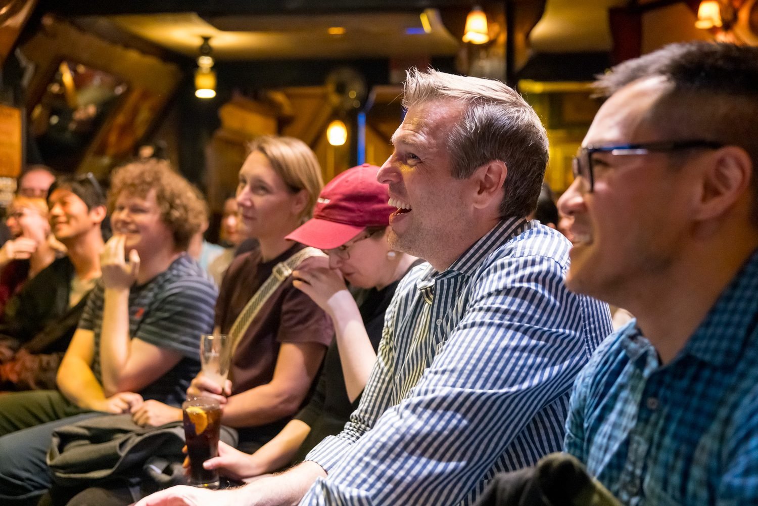 Sunday night in Tokyo, audience laughing at an improv comedy show at What the Dickens! pub in Ebisu | 日曜の夜 東京 過ごし方 サザエさん症候群 恵比寿 即興コメディ | Pirates of Tokyo Bay