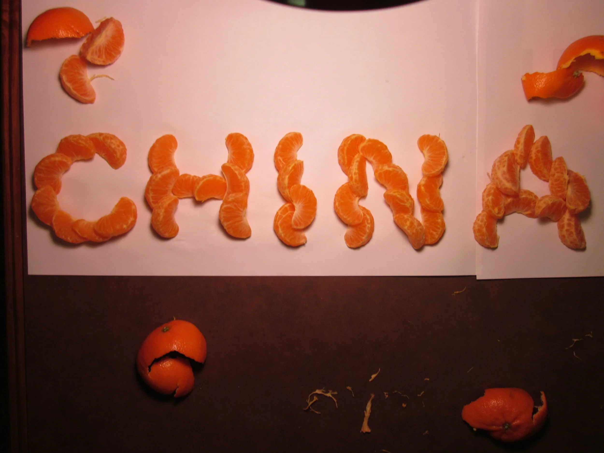  pronounced chee-nah, typographic exploration on an orange in Spanish (Puerto Rican) 