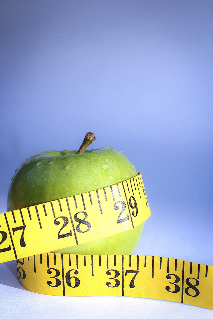 Manzana con Cinta Métrica