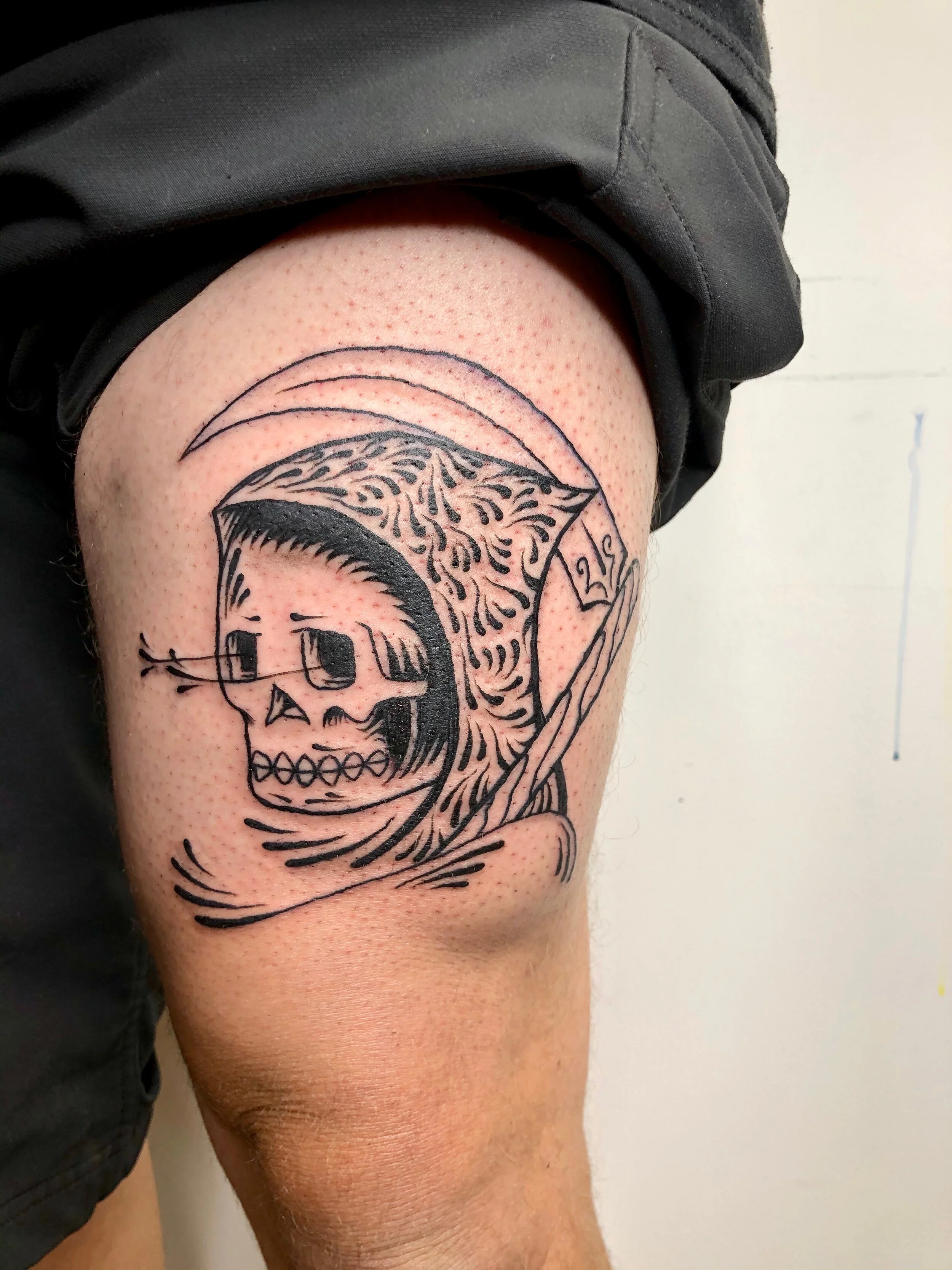 Dustin Klein Permark Commotion Reaper tattoo.jpeg