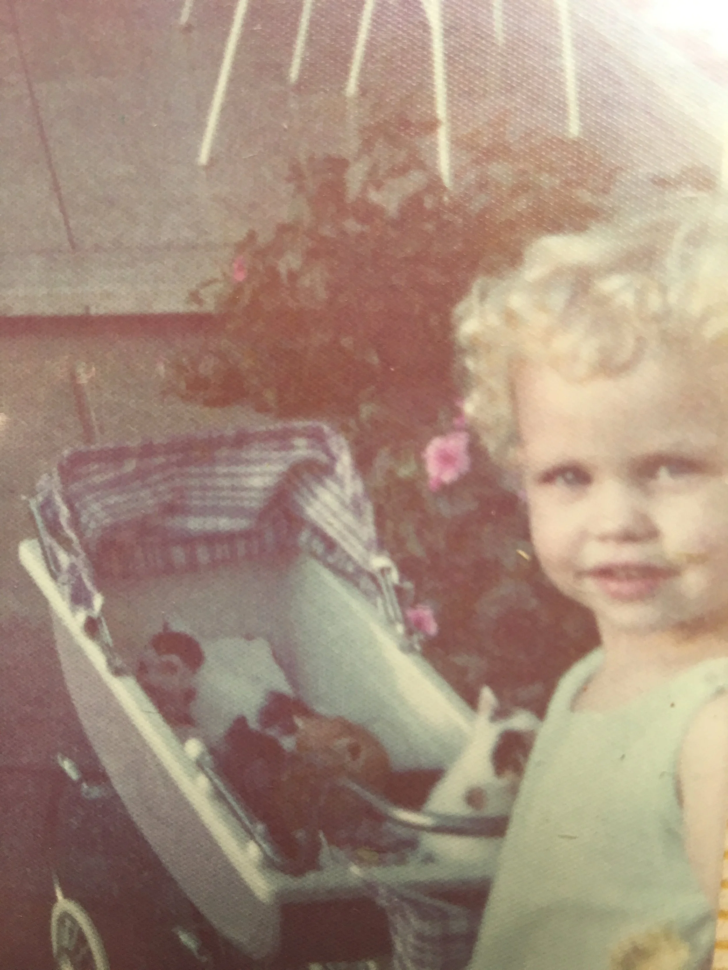 I'm three here --- with my baby pram and a litter of kittens!! Heaven!!