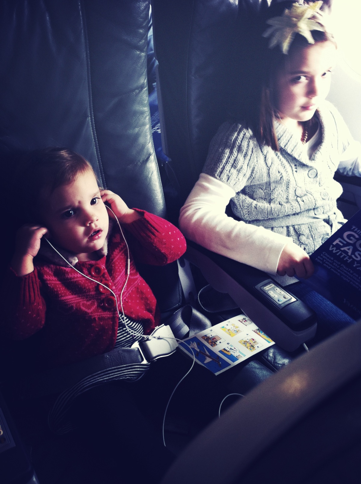 Halle and L-baby at 10,000 feet. Can you tell this 2-year old gets a lot of air miles? She’s a total pro at the inflight entertainment.