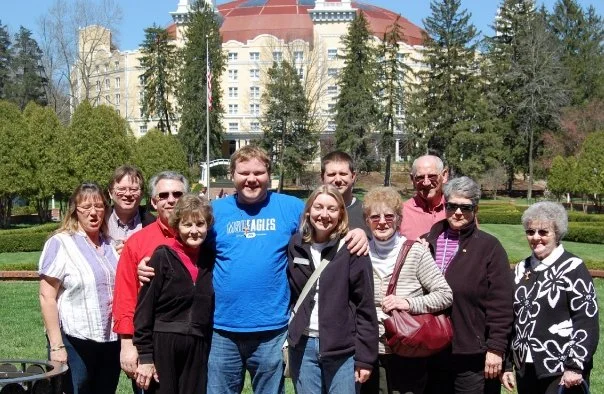 Some of the group poses for a picture in the garden.