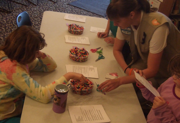 ​Sarah Werley, &nbsp;some scouts and friends enjoy an activity during the exhibit opening. 