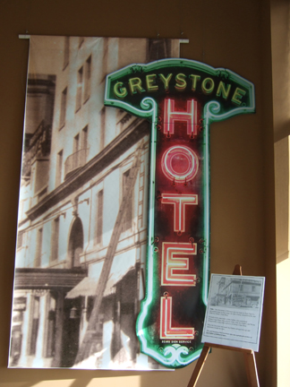  The large photo of the building and almost lifesize reproduction of the hotel sign was created and donated by Johnny's signs. 