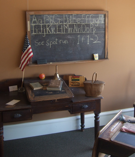  The chalkboard was hung at the front of the room, and students would be asked to come to the board and write the answers to questions in the related &nbsp;subject in which they were learning. 