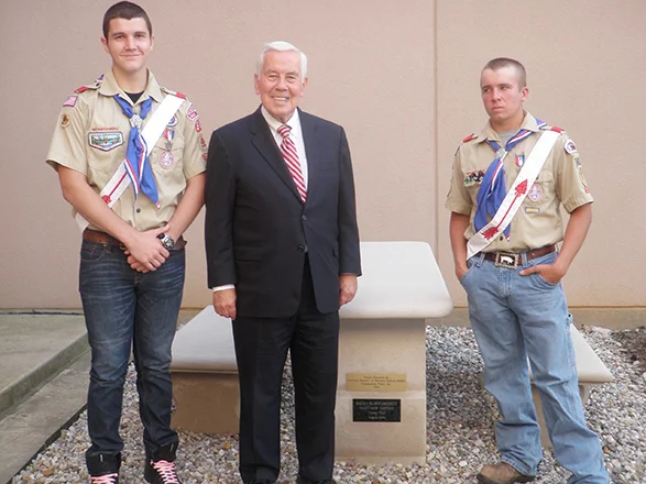 20011—In this picture, Sen. Lugar, an Eagle Scout himself, congratulates Boy Scout Troop 343 Eagle Scouts Matthew Bayens and Darren Phillips. The limestone table and benches in the background were provided as Matt Bayens' Eagle Scout project.