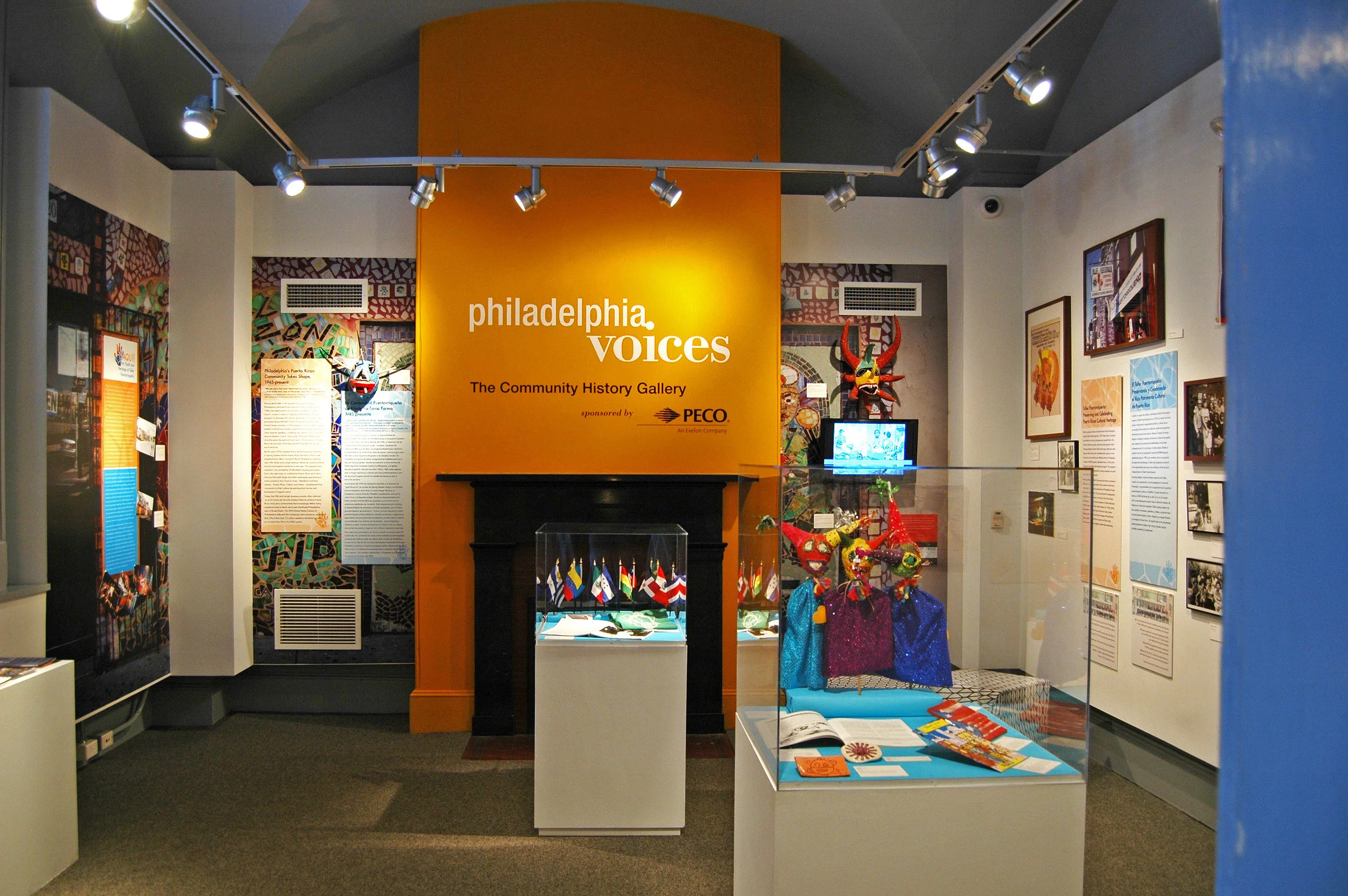 — Exhibition design used images of Taller's front door to transport visitors to "El Corazón Cultural del Barrio"