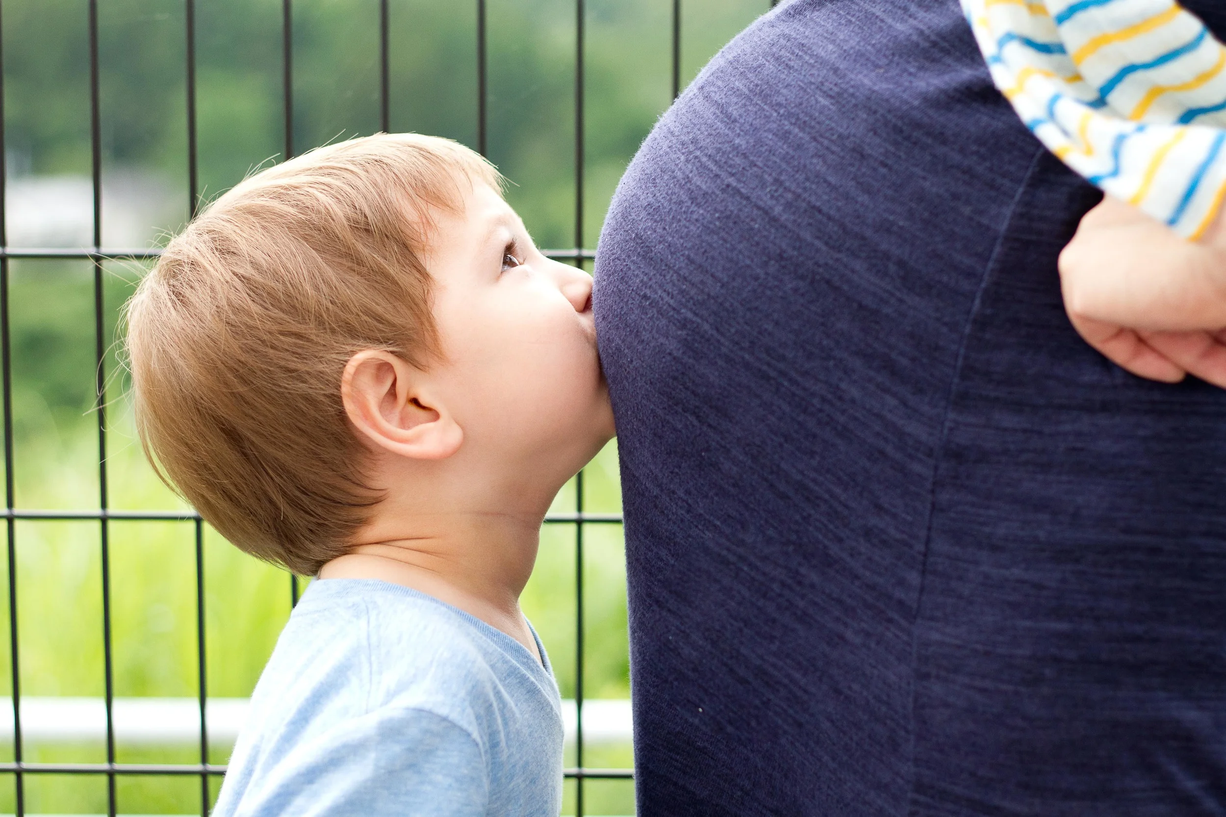 Big brother kisses