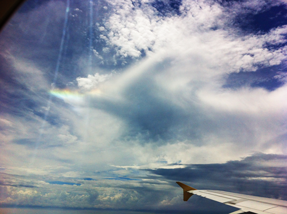 Caught this moments before we touched down at Bali airport. Is it a rainbow? Or the presence of an Angel?!! :D