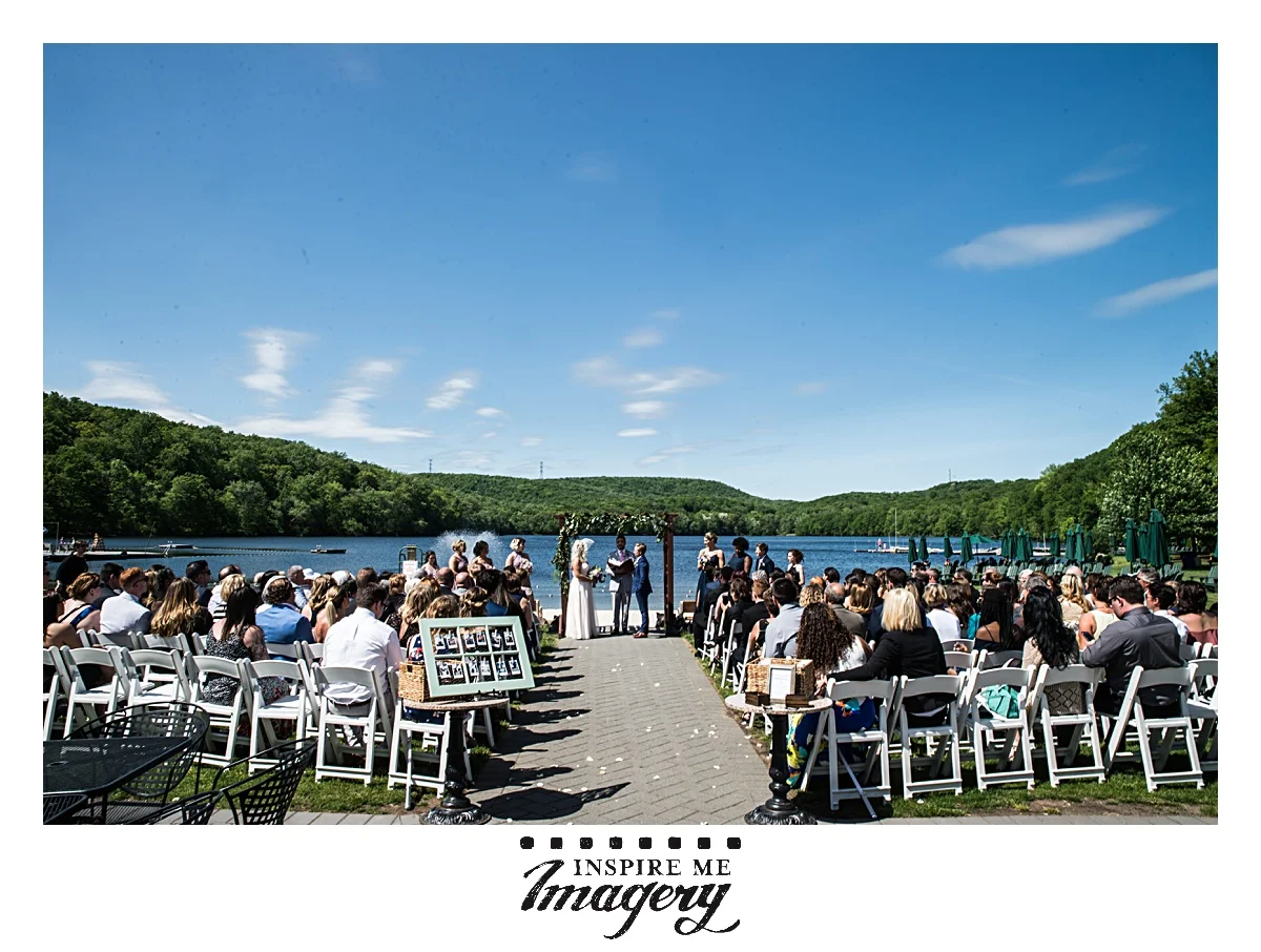 The backdrop of Lake Valhalla is so perfect for a wedding ceremony.