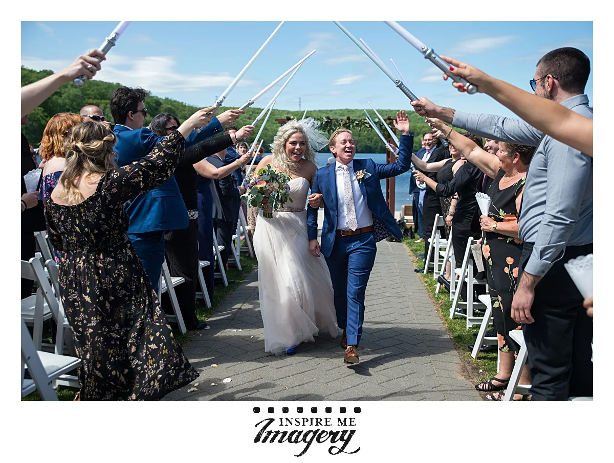 Light sabers!! The bride and groomswoman got to walk under light sabers!