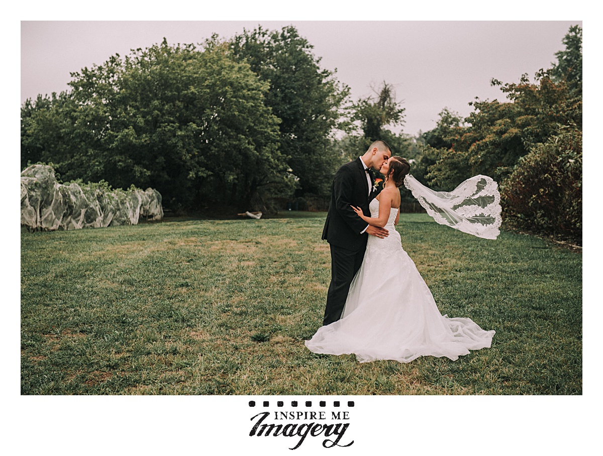 A little breeze helped with the veil for this wedding portrait.