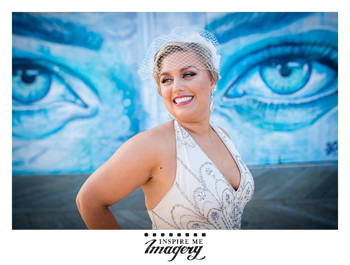 The murals at the boardwalk in Asbury Park are so fantastic and make a great backdrop for wedding day portraits.
