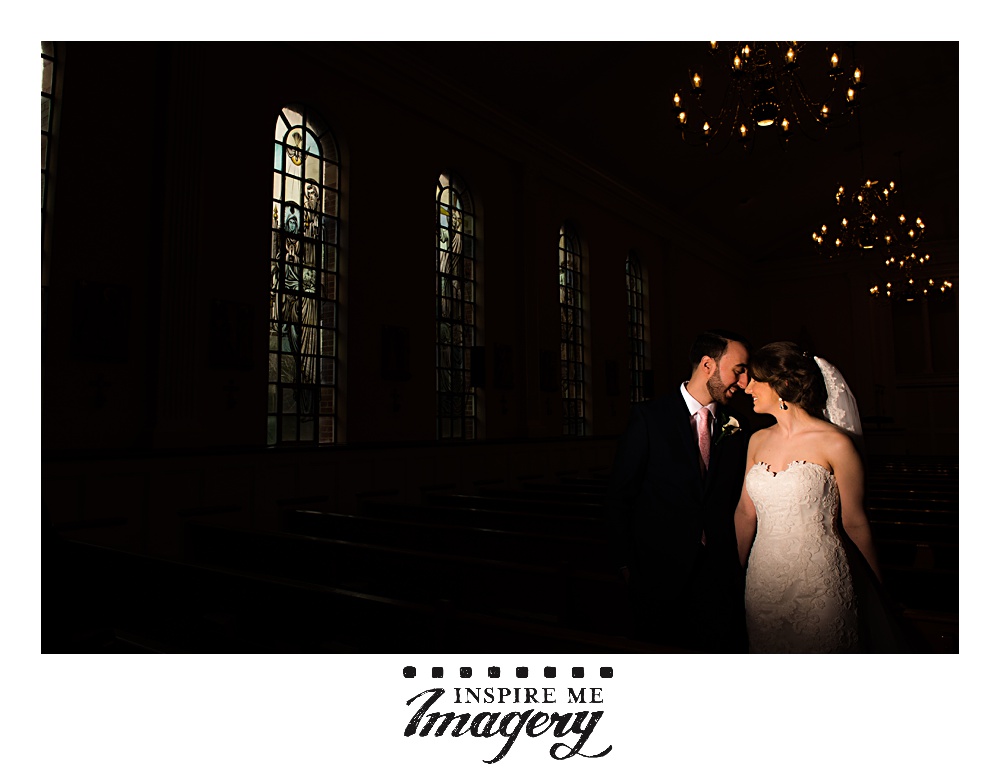 A quick dramatic portrait in the church before heading out to the wedding reception.